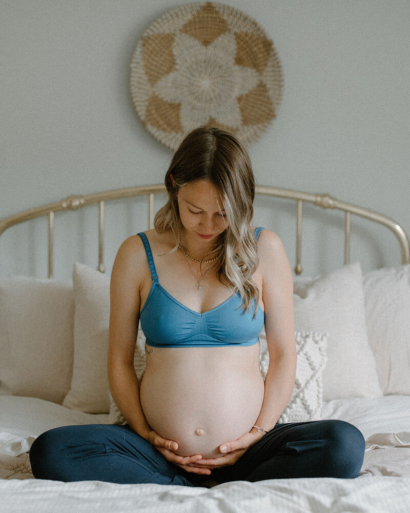 pregnant woman wearing nursing bra